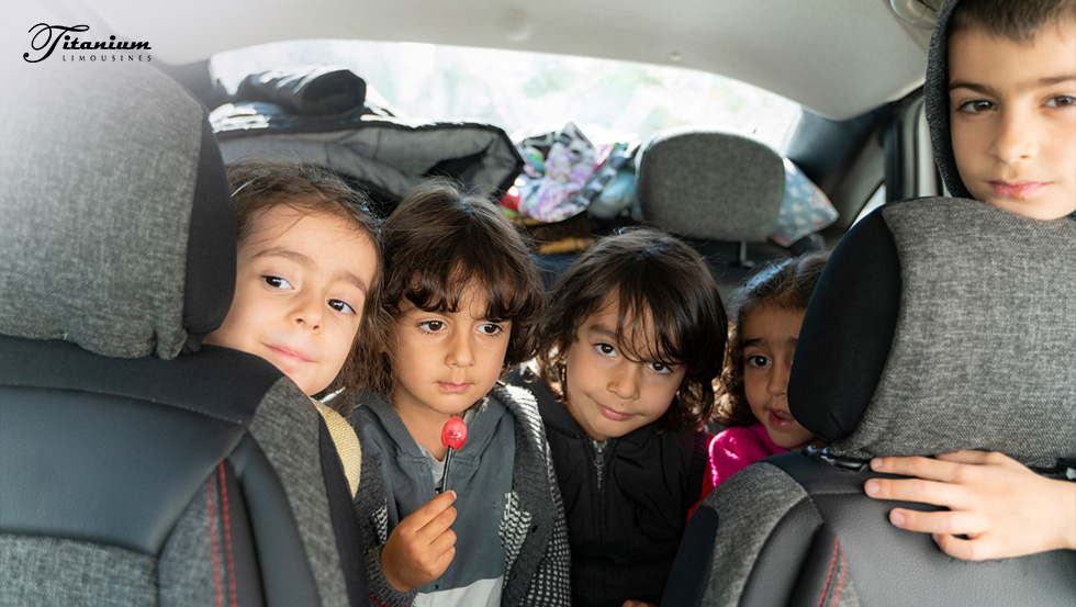 Children sitting in the backseat of the car